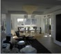 Living.<br />Illuminazione: sul tavolo da pranzo lampadari “High Tech Falls“, in mezzo lampadario “ice chandelier” , sulle pareti “light blade”.